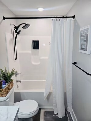 Hair dryer, towels, soap, toilet paper