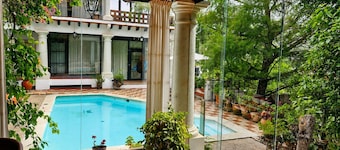 Villa Oaxaca, a stately residence with 6 suites, art, culture, nature, and a pool