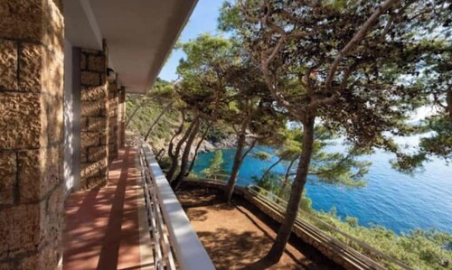 Exclusive Villa in Cala Piccola: Panoramic Views and Private Sea Access