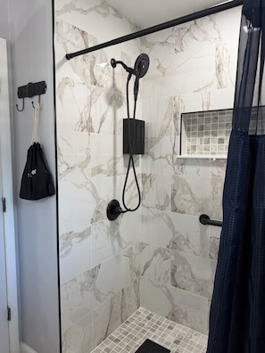 Shower, hair dryer, towels, soap