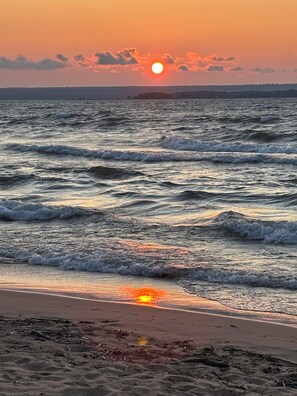 On the beach, sun-loungers, beach towels