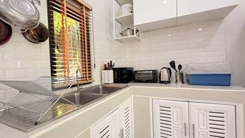 Fridge, stovetop, cookware/dishes/utensils