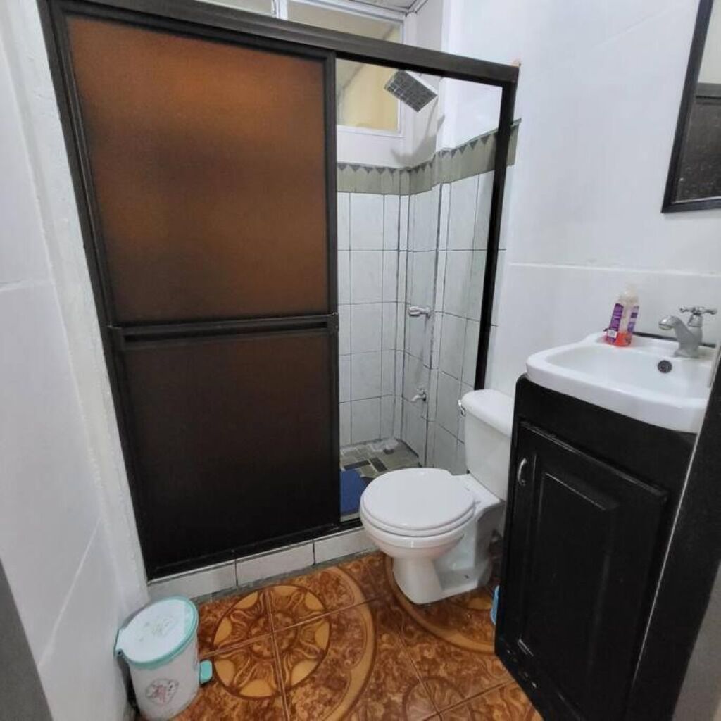Shower, towels, soap, toilet paper
