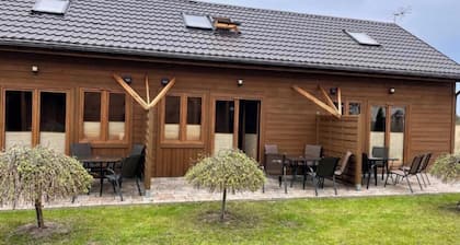 Wooden holiday homes by the sea in Grzybowo in a quiet location