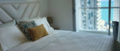 Condo familiar, vista al mar | Ropa de cama de alta calidad y edredón