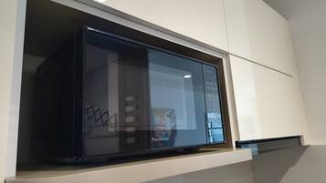 Apartamento familiar, vistas al mar | Microondas