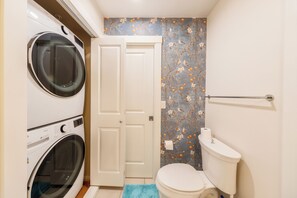 Hair dryer, towels, soap, toilet paper