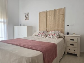 2 dormitorios, tabla de planchar con plancha, wifi y ropa de cama