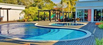 Condominium House Pink with pool, gym, next to SurfLand.