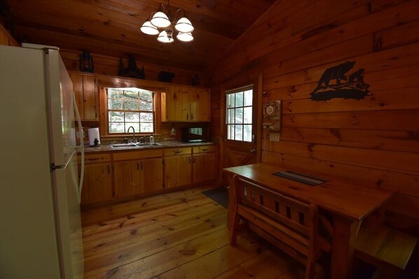 Fridge, microwave, oven, stovetop - Cozy Secluded Cabin: Hot Tub, Fireplace & Firepit (Cherry Log)