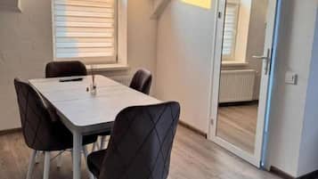 Apartament Deluxe, vistes a la ciutat | Servei de restauració
