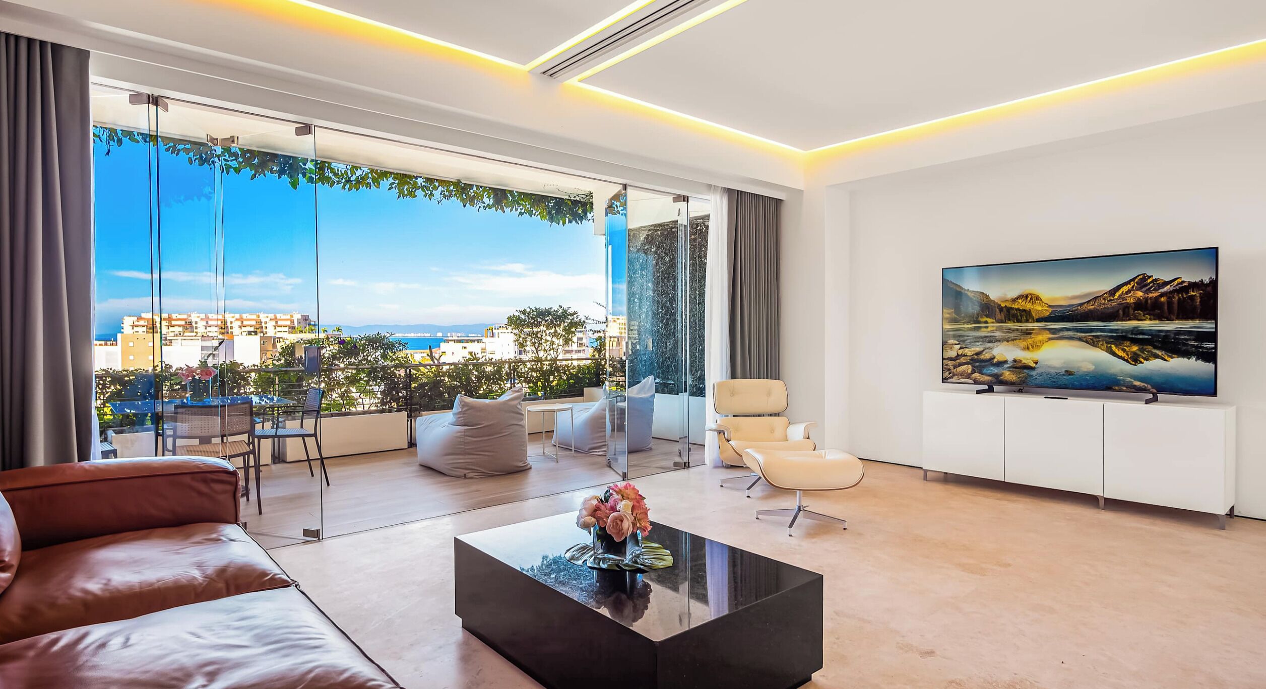 Luxury Condo, 1 Bedroom, 2 Bathrooms | Living area | 50-inch Smart TV with satellite channels