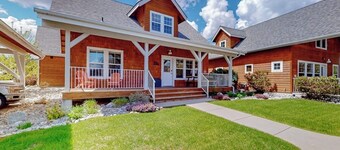 Adorable, two-story home with a furnished front porch, fireplace, & washer/dryer