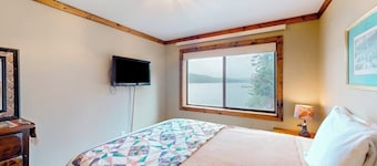Lakefront hideaway with games, grill, smart TVs, mountain views, & AC