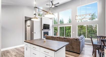 Secluded home with deck, grill, hot tub, fireplace, private beach, & W/D