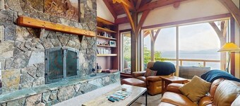Beautiful lakefront lodge w/ views, private beach access, & large deck