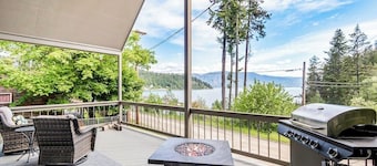 Beautiful 3-story home with lake/bay views, deck, grill, firepit & fireplace