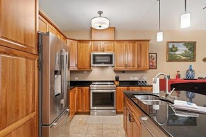 Fridge, microwave, oven, stovetop - Lake view condo with WiFi, balcony, fireplace, & shared pool/hot tub/grills (Sandpoint)
