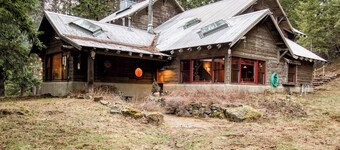 Rustic woodland home with hot tub, patios & fireplaces - near lake access