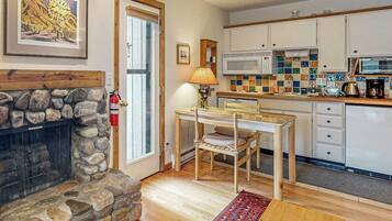 Microwave, stovetop, dishwasher, coffee/tea maker