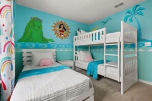 A children's room with bunk beds, a mural, and a curtain with a rain pattern. - 5 BD/ 4.5 BA Windsor Cay (1276 BP) (Clermont)