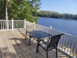 Outdoor dining - 3-bedroom lakefront cottage in Ocqueoc with AC (Ocqueoc)