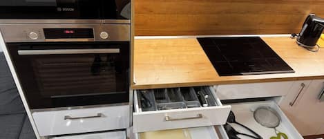 Coffee/tea maker, fridge, microwave, oven