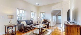 Centrally located charmer with expansive patio, board games, & central AC