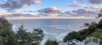 Modern oceanfront home with scenic deck, grill, games, chef's kitchen, & W/D