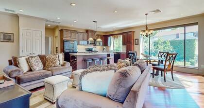 Centrally located open concept apartment with parking, central AC, & W/D