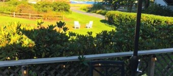 Beach-view home with beach access, deck, grill, 2 kayaks, & AC