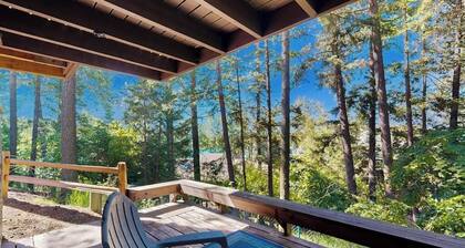 Lake-view home with private beach access, pool, hot tub & sauna