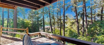 Lake-view home with private beach access, pool, hot tub & sauna
