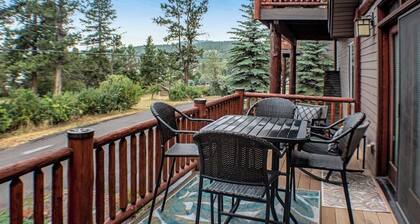 Updated condo with peek-a-boo lake views, deck, W/D, fireplace, & lake access