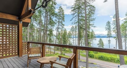Wilderness retreat with a large deck, grill, updated interior, fireplace, and AC