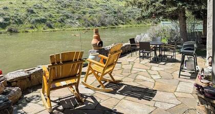 Dog-friendly waterfront cabin on Flat Creek with wood stove, creek view, firepit