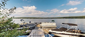 Lakefront condo with on-site pool, dock, swimming, firepit, & tennis