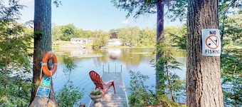 Entire lakefront home on Togus Pond with decks, canoe, firepit & great view