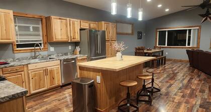 American Dream is a Cozy 2-bedroom bungalow in charming Loon Lake with AC