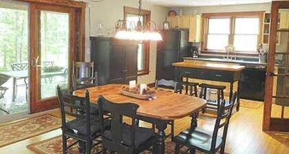 Spacious river home w/ pellet stove, outdoor dining area, fire pit, & BBQ grill
