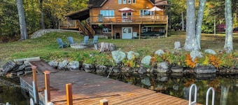 Lakefront, dog-friendly home with dock, kayaks, SUPs, canoe, huge deck & firepit