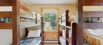 Beautiful log cabin with nearby skiing, large living spaces, and outdoor patio