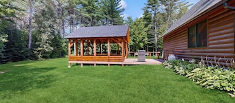 Beautiful log cabin with nearby skiing, large living spaces, and outdoor patio