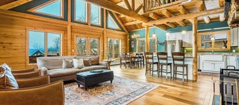 Cedar log home w/ large deck, game room, views & skiing nearby
