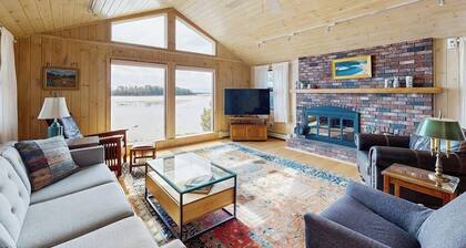 Waterfront home with furnished deck, ocean views, & full kitchen