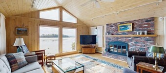 Waterfront home with furnished deck, ocean views, & full kitchen