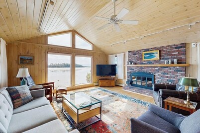 Waterfront home with furnished deck, ocean views, & full kitchen