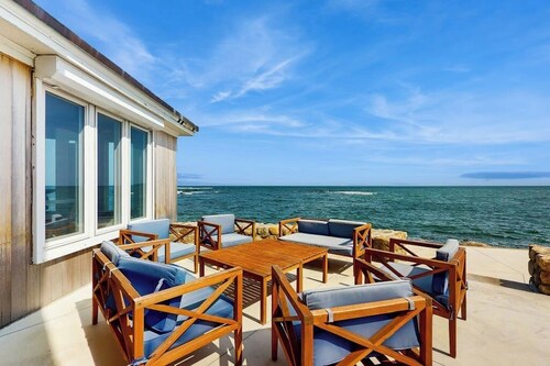 Coastal gem on the water with beach access, gorgeous views & spacious layout