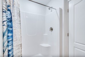 Shower, jetted bath, towels, soap