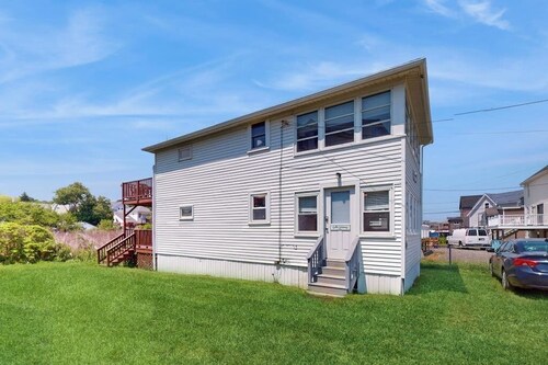 Sun-filled & serene coastal retreat with deck & stunning ocean views - near golf